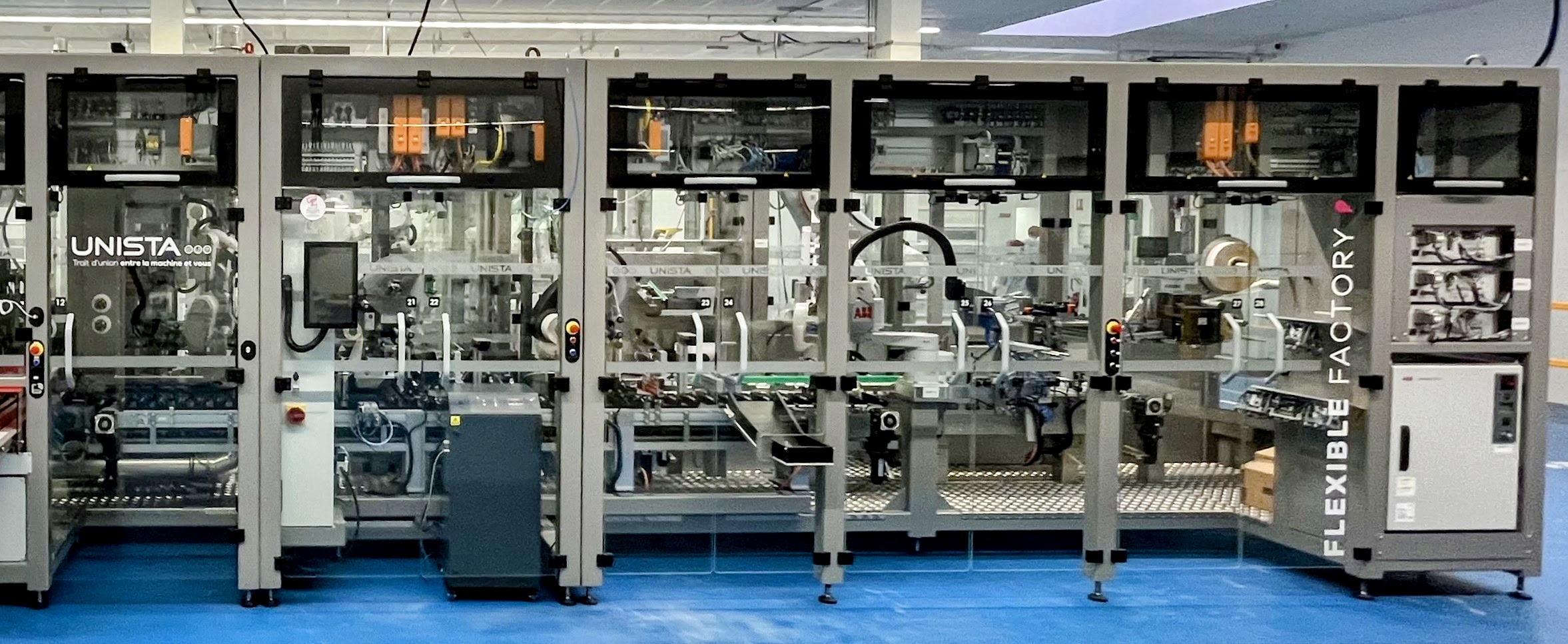 Ligne de remplissage fragrance avec convoyeur magnétique